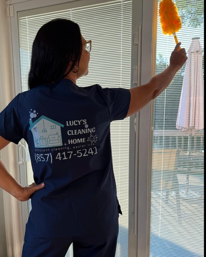 Lucy’s Cleaning Home uniform with the company logo and phone number, Haverhill, MA